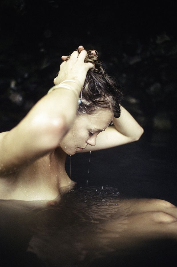 Nude woman in water