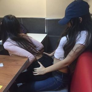 my cousin give her friend a lapdance in a public restaurant. What a nice whore!