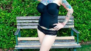 Bomby Blondshell is a cleaver duck without a head as Sam Harris's Headless Way program as a goth model by a bench outside - SGB gothh ta2