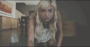 Eliza Jane crawling in her white dress