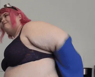 Beccabae shows huge arms and dances