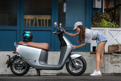 Hot Asian bending over bike
