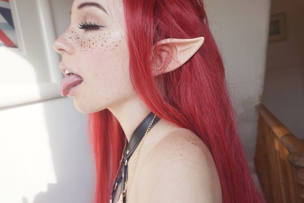 Horny red head cosplay babe