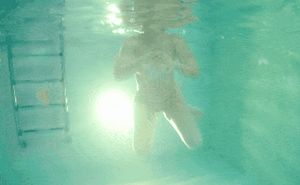 Tits of my girlfriend in the pool