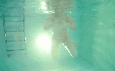 Tits of my girlfriend in the pool