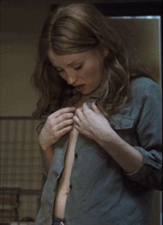 Emily Browning strips