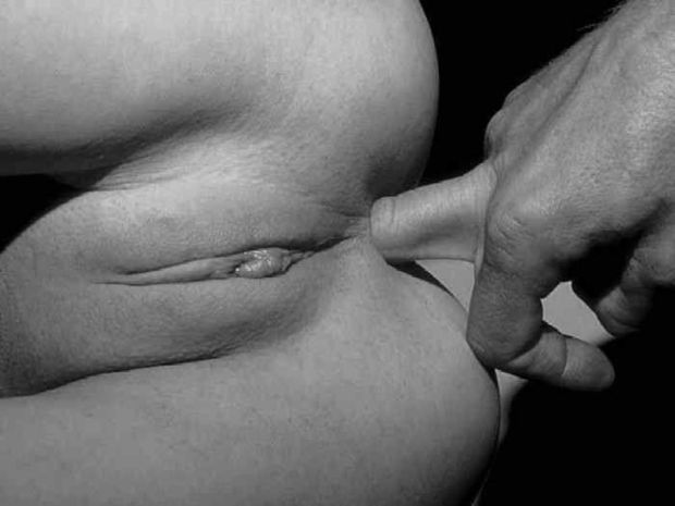 A finger up her bum.