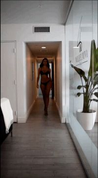 sensual brunette walking around