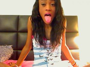 Amazing black chick with tongue out.