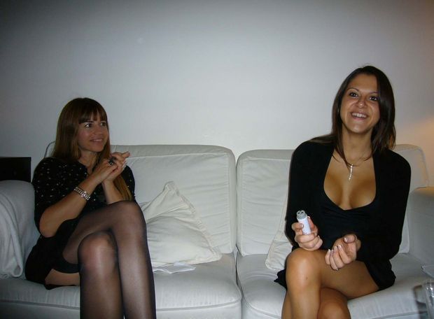 MILF unaware of her stockings showing