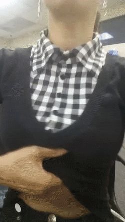 sexy lady flashing her tits at work
