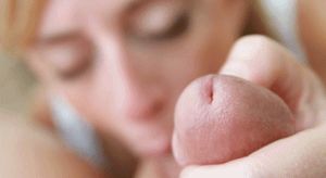 Massaging the frenulum and balls sucking