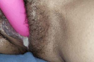 Creamy, cum filled pussy rubbed with vibrator.