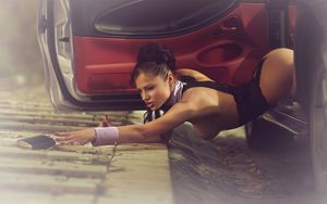 Her perfume fell out of the window. I allowed her to pick it up, but only if her ass stays in the car!