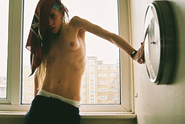 topless tomboy in window