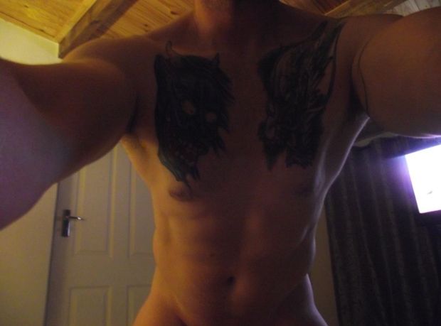 Selfie of athletic male tattooed