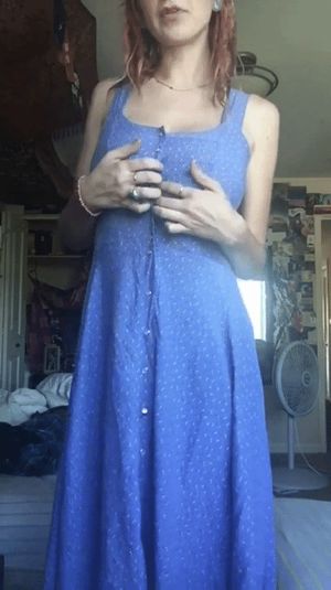 Redhead flashes her giant tits and skinny body