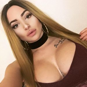 Fat Latina bitch with huge boobs as a non-nude super model of bimboism w/ caked make-up & giant plump lips & cleavae - SGB lipz