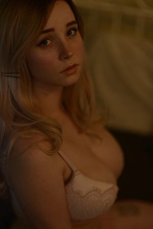 Purity Knight has cleavage that is out w. natural breasts