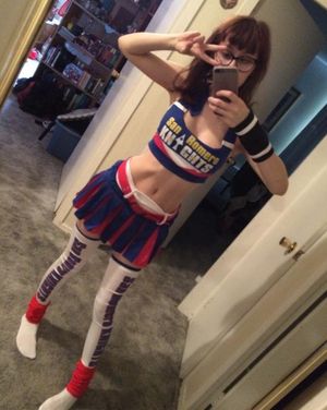 Alabama FireCracker is teenage Lollypop Chainsaw cheerleader cosplay in cute leggings - SGB tteen