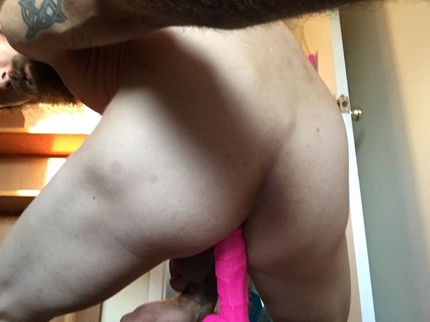 White guy rides pink dildo