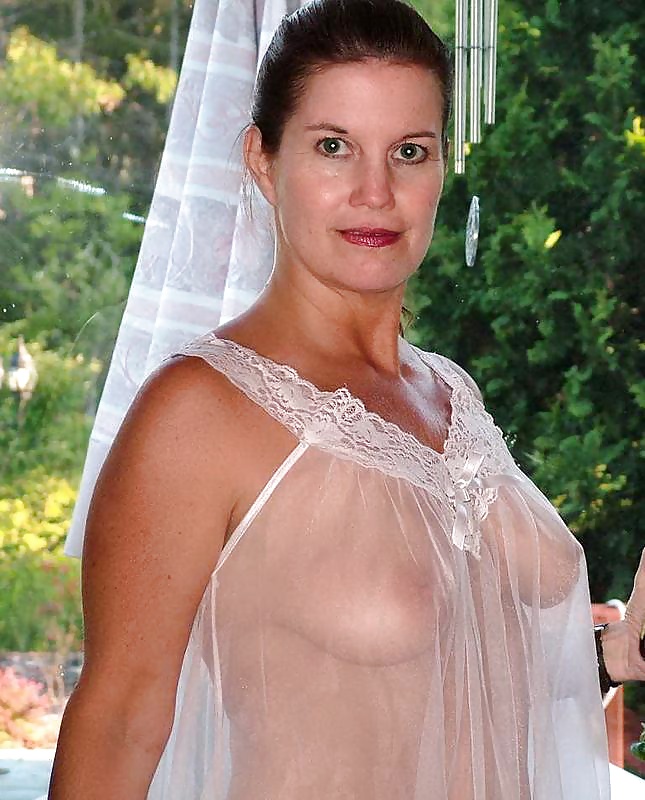 Stacked mom Nicole has a change of heart and poses in her finest negligee