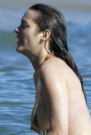 French Actress Marion Cotillard Reveals Big Boobs