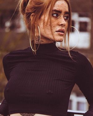 Redhead Nippin Through Her Sweater