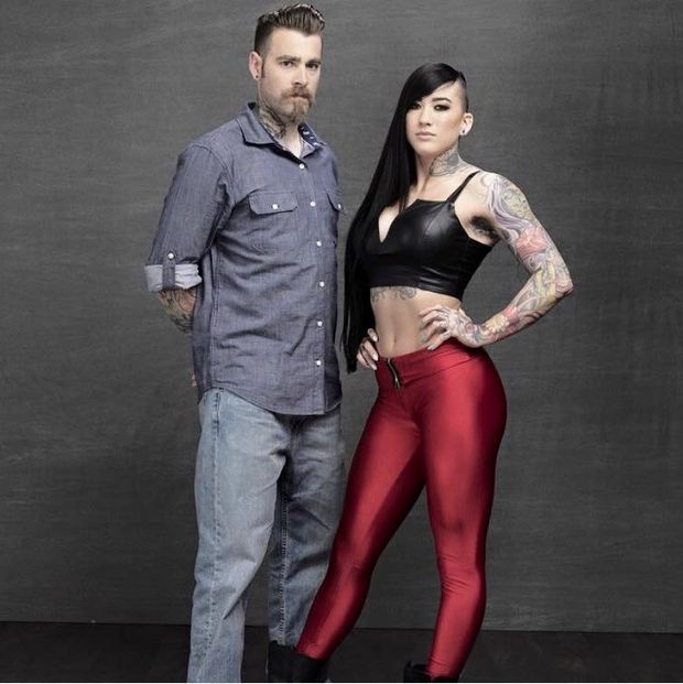 Genevieve Zitricki is alt facsimile imitation of flawless miniature sex model with goth hair while standing next to a soyboy - SGB lett