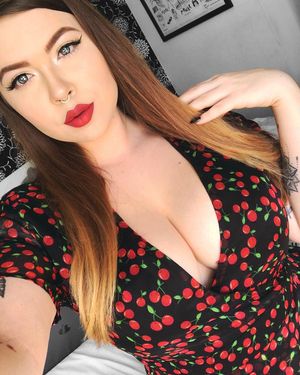 Brunette with nose ring and big tits