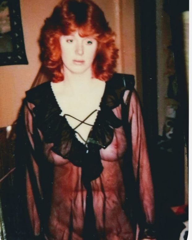 Hot redhead wife showing nice tits in see though lingerie