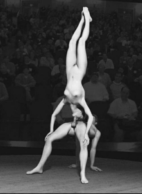 Handstand blowjob. With audience