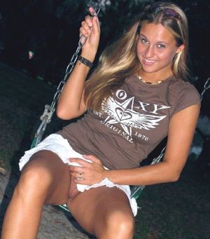 Sexy wife on a swing