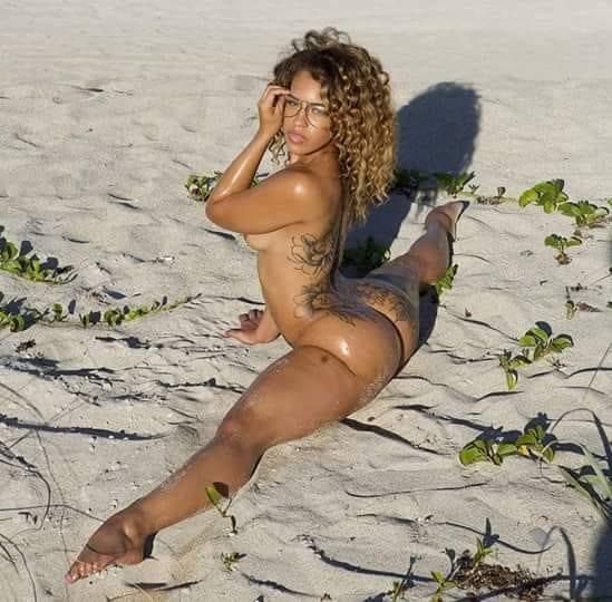 hot ebony in beach