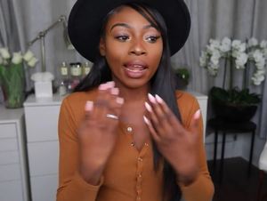 Patyy Baby in the cutest button up button-snap outfit as a beautiful black woman & long nails in buttun snaps - SGB zxzx outfitt