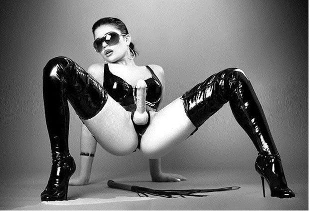 Hot Sexy Mistress In Latex Wearing Strapon