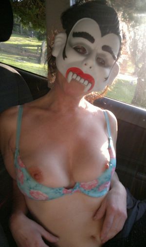 Milf getting ready for Halloween party