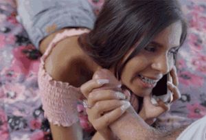 Interrupting his step-sis as she talks to her boyfriend on the phone.