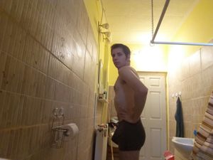 His dick is stiff in his boxer shorts