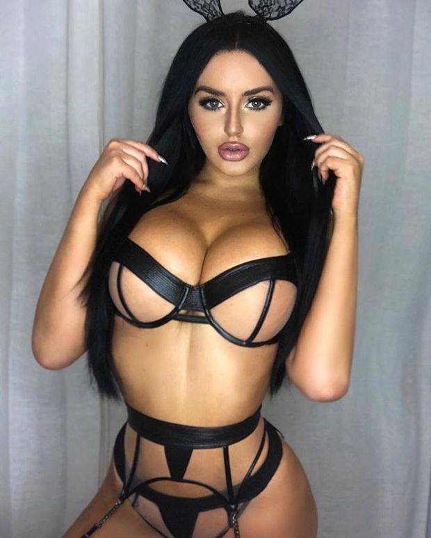 Busty babe wearing halloween costume