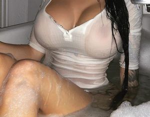 Mondo over sized breasts pushing cleavage out of wet see though polo of mighty Z cup mountainous boobs showing to elephantine leviathan