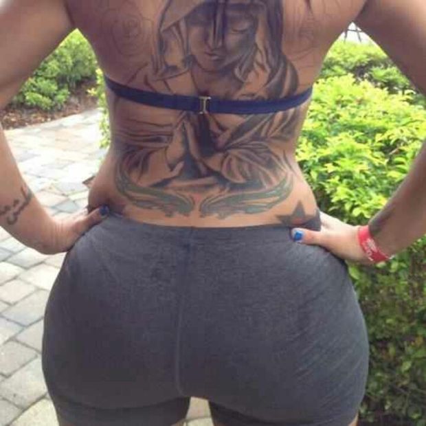 Phat ass with a lady tatoo praying over it