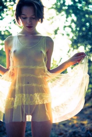 Brunette In Yellow See Through