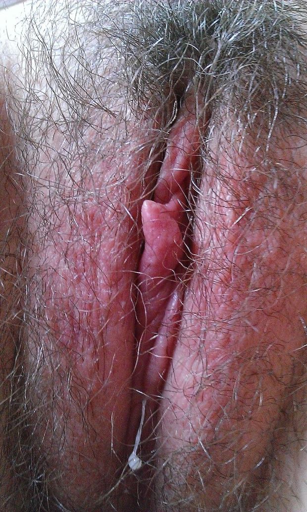 Hairy muff shown very close after climax.