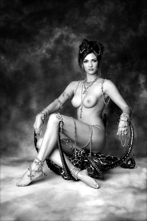 Heavily adorned slavegirl