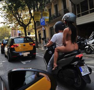 Way to ride through the city nude.