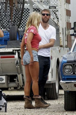 Brittany Daniel in tight shorts and shirt