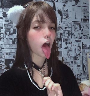 Pierced Nose Teen Sticks Tongue Out
