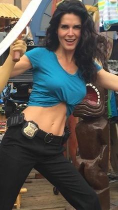 Angie Harmon right toned abs