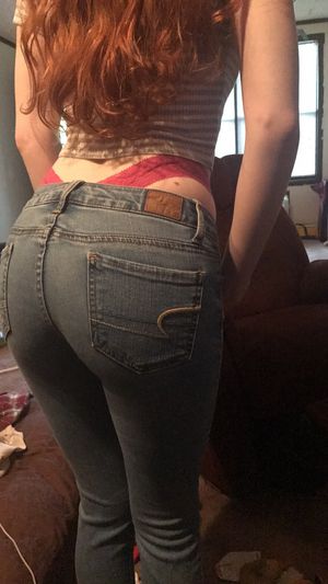 redhead with nice ass in jeans and thong showing